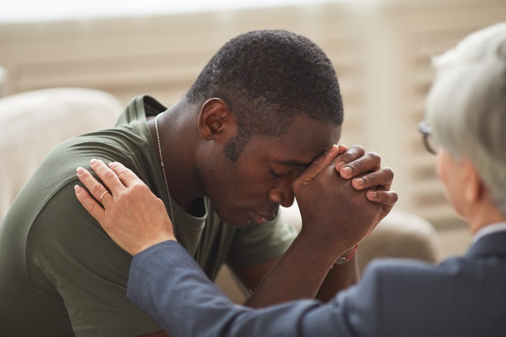 depressed-man-at-the-therapy-2021-08-30-05-05-13-utc